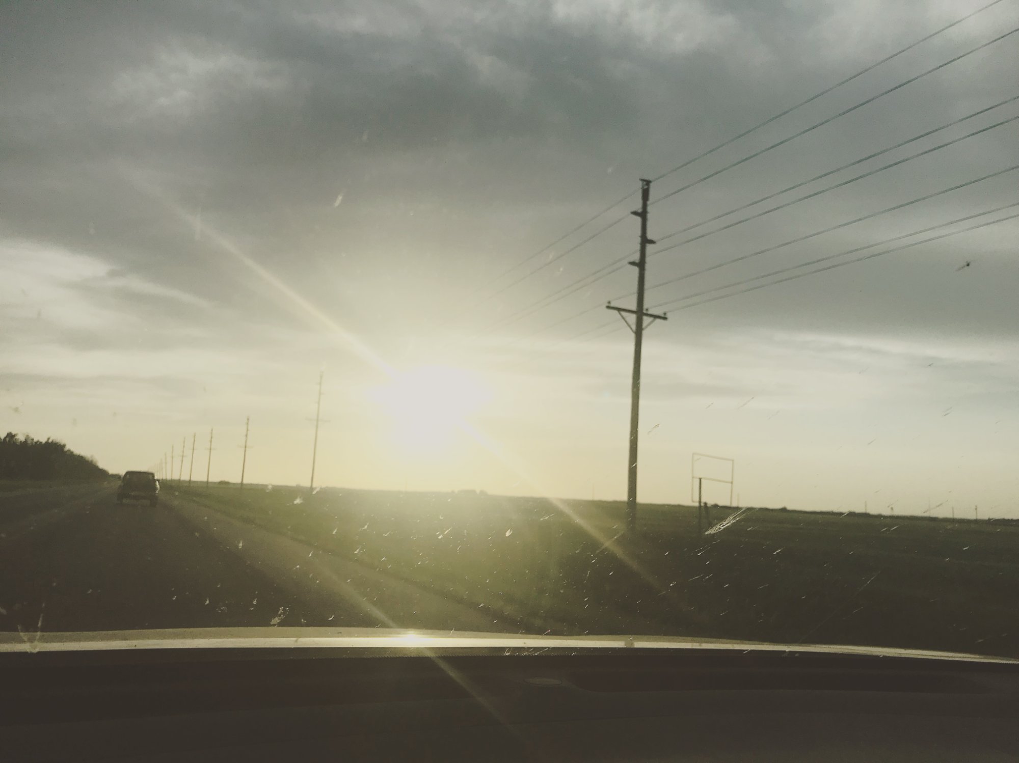 Kansas highway at sunset
